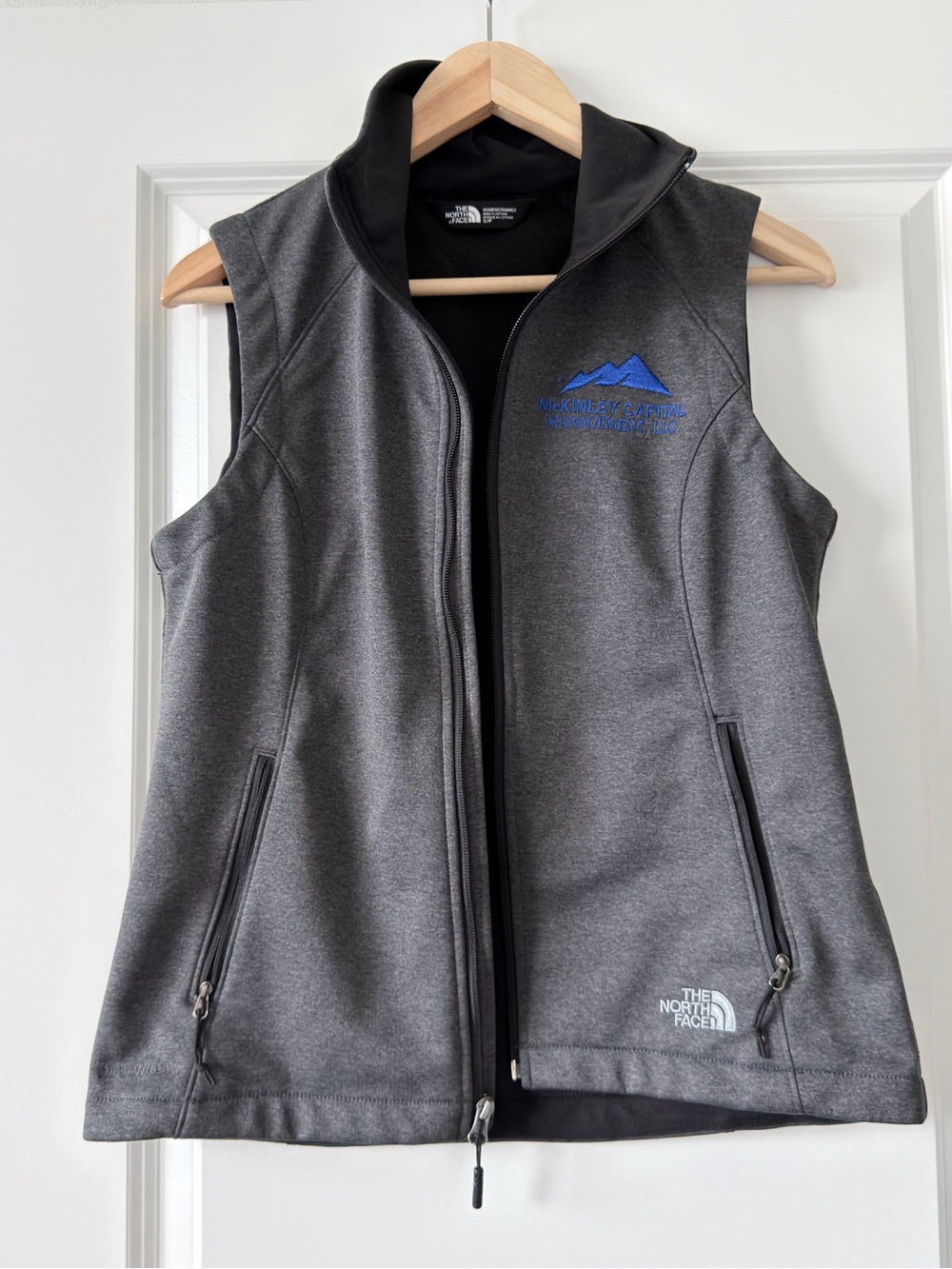 The North Face Women's Charcoal Gray Softshell Vest with Blue Logo
